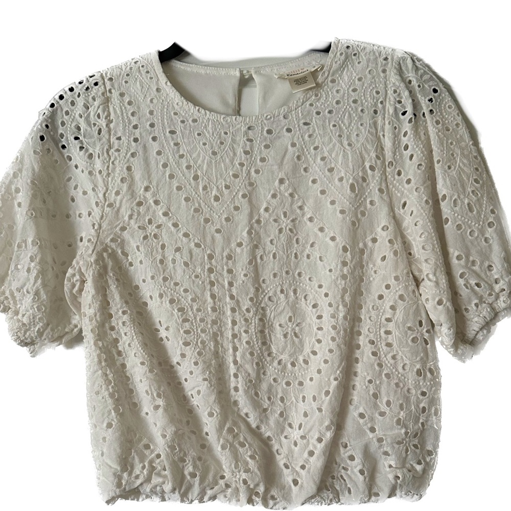 White top with puff sleeves and eyelet detail